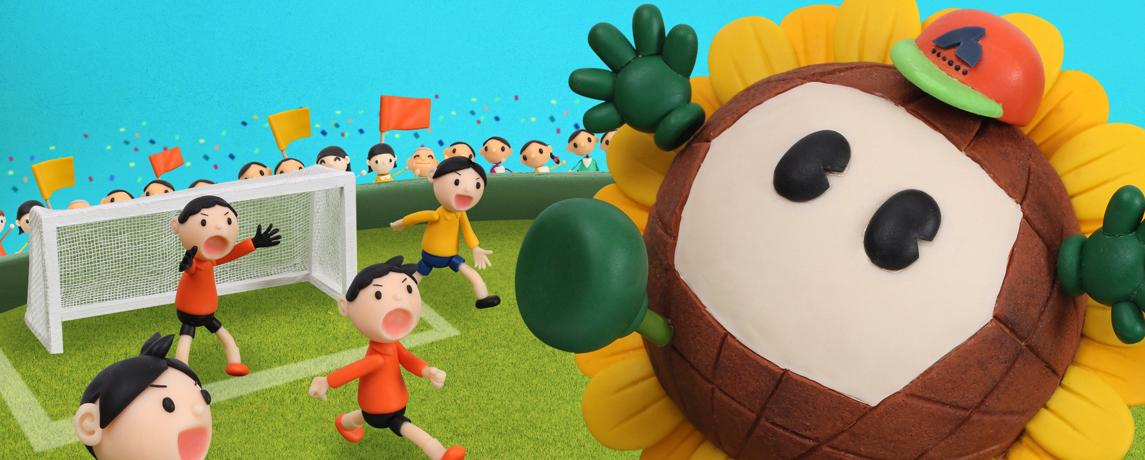 【クレイアート／粘土立体イラスト】<br>ひまわりネットワーク 新聞広告 10月号 “少年サッカー放送” ビジュアル制作