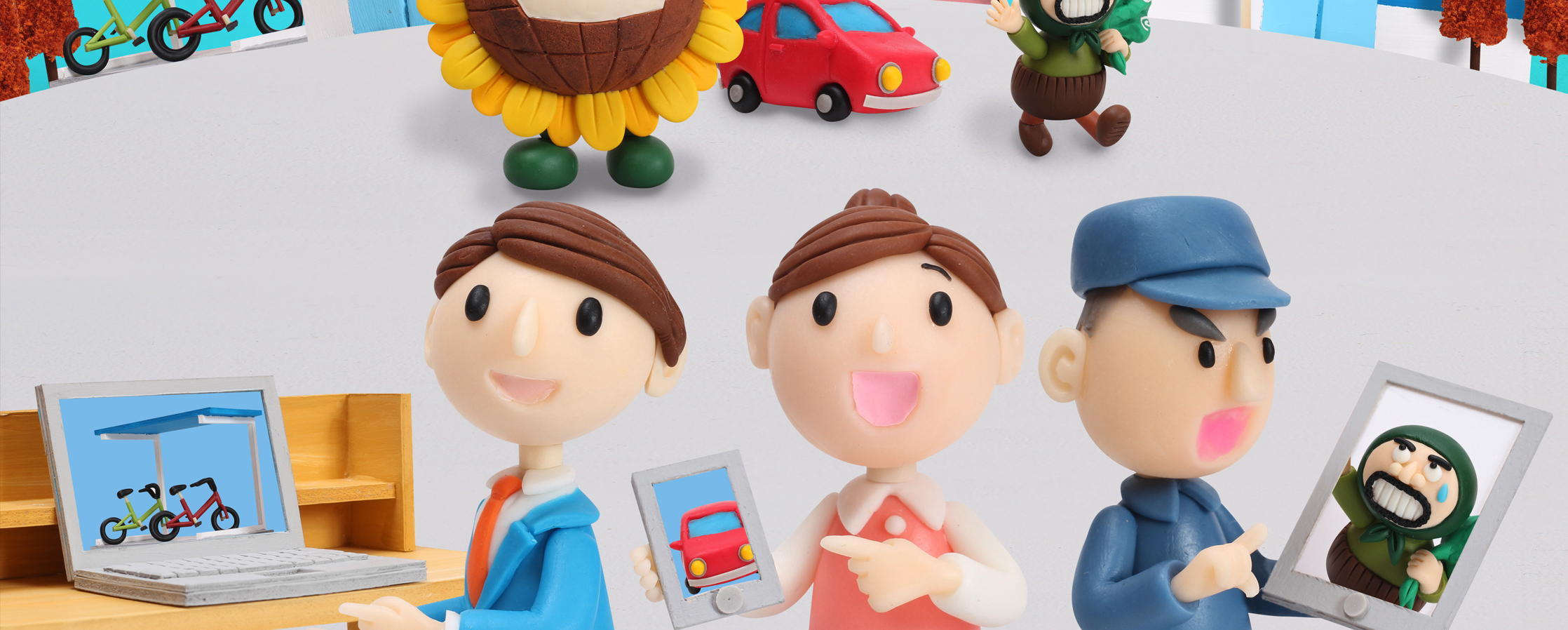 【クレイアート／粘土立体イラスト】<br>ひまわりネットワーク 新聞広告 11月号 “防犯カメラで安全をチェック！” ビジュアル制作