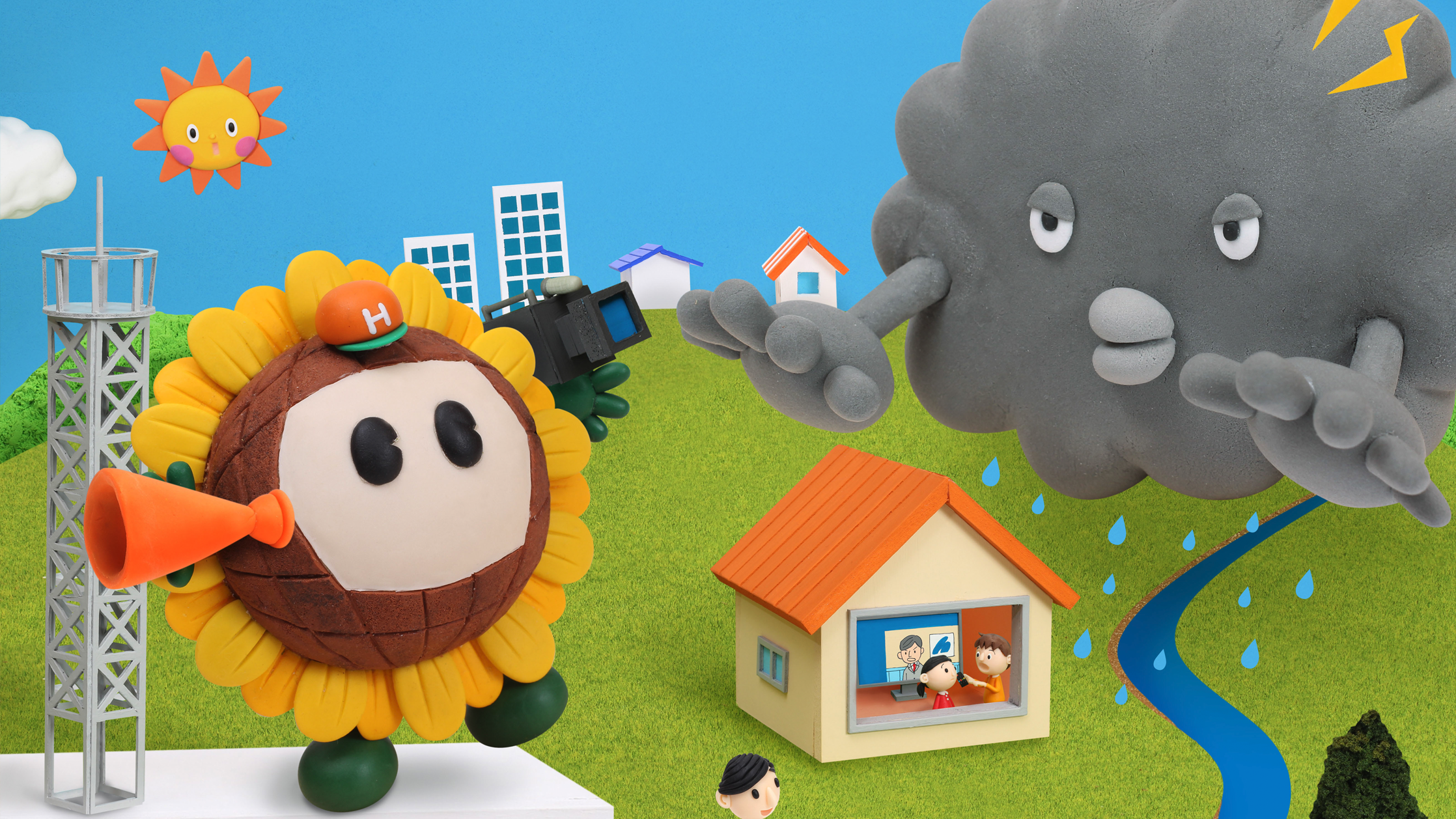 【クレイアート／粘土立体イラスト】<br>ひまわりネットワーク 新聞広告 7月号 “台風情報の緊急放送番組” ビジュアル制作